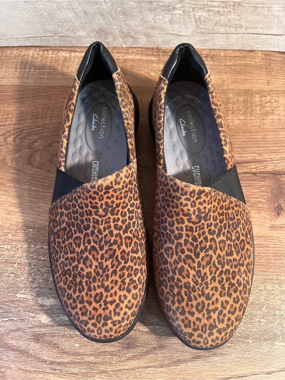Clarks Cheetah Print Slip-On Flats in Brown and Black Kayleigh Step Loafers